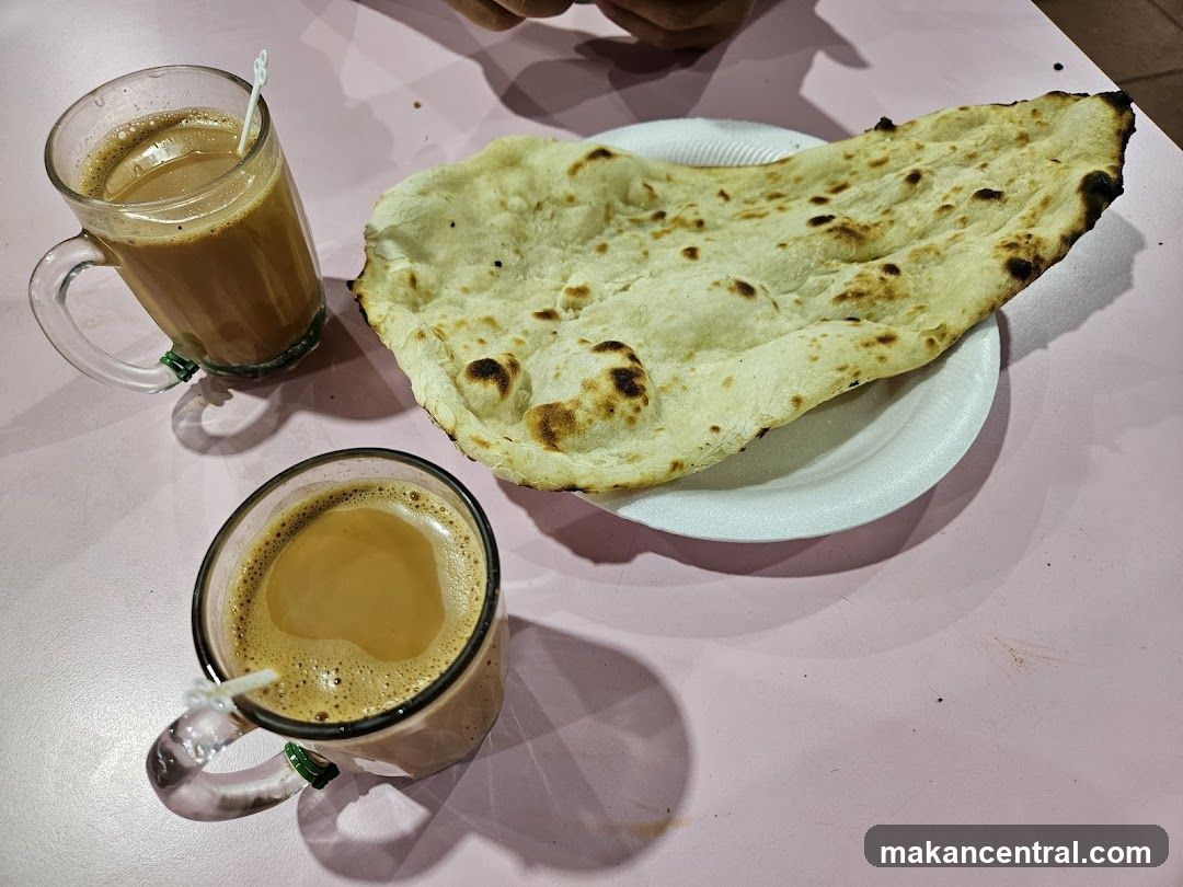 Two cups of tea and naan bread