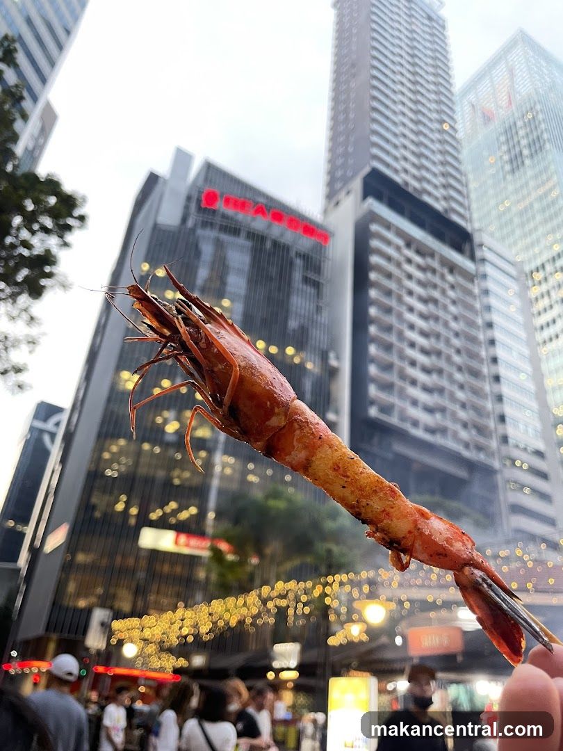 Grilled Shrimp Skewer with Cityscape Background