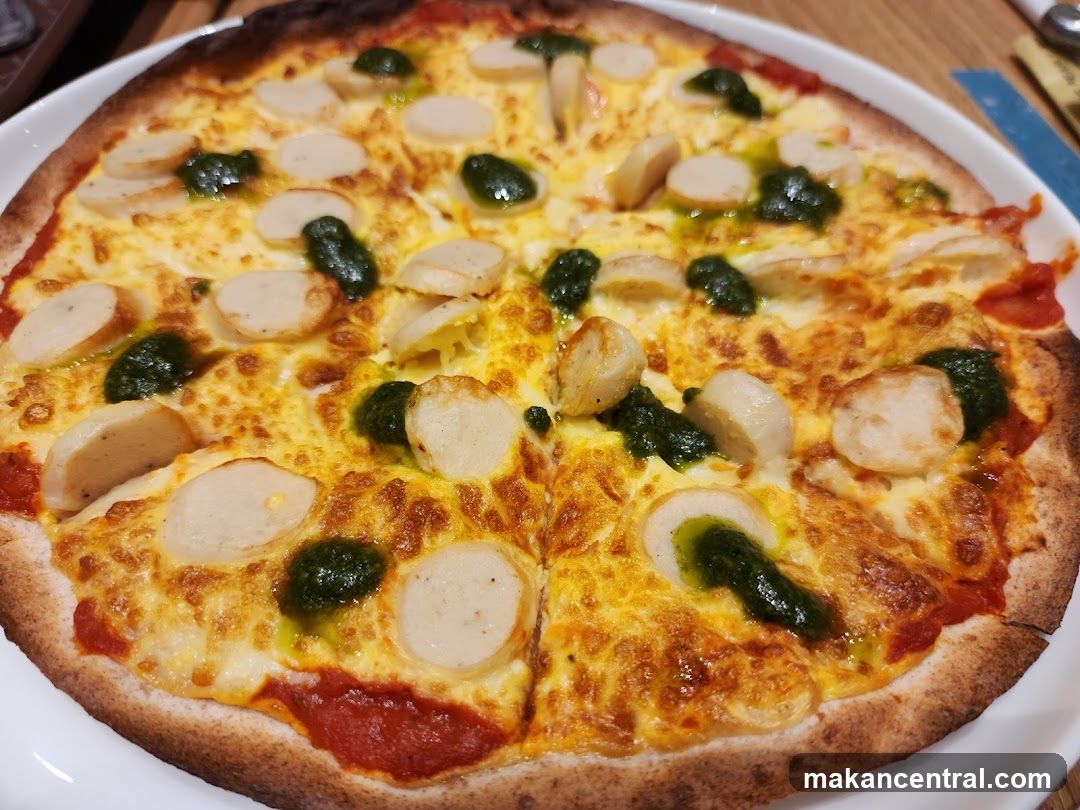 Pizza with Sausage and Pesto