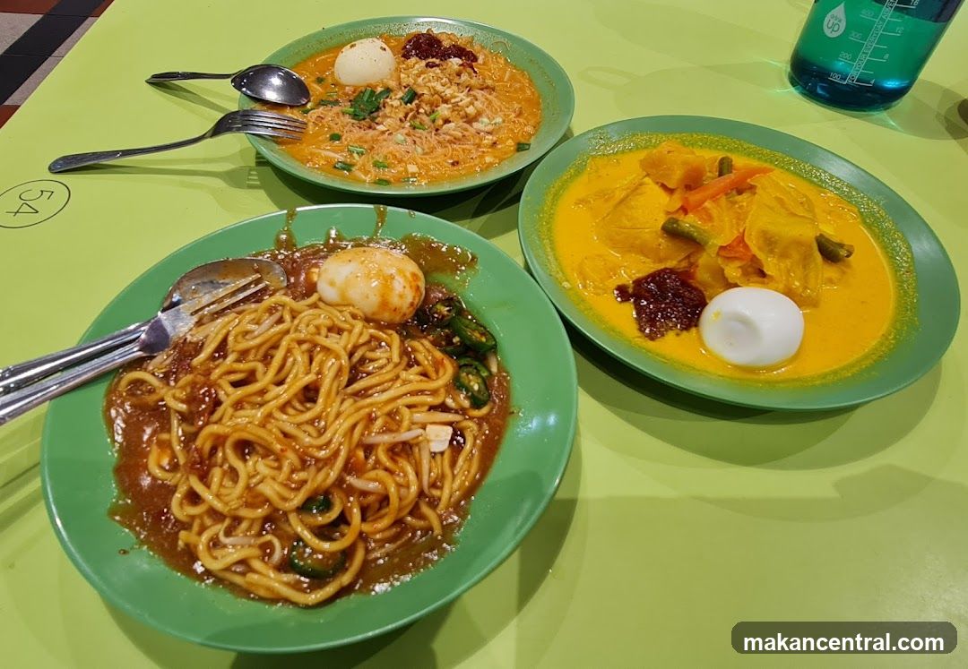 Three plates of noodles and curry