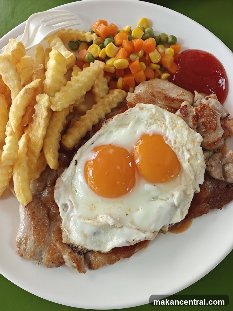 Steak and Eggs with Fries and Vegetables
