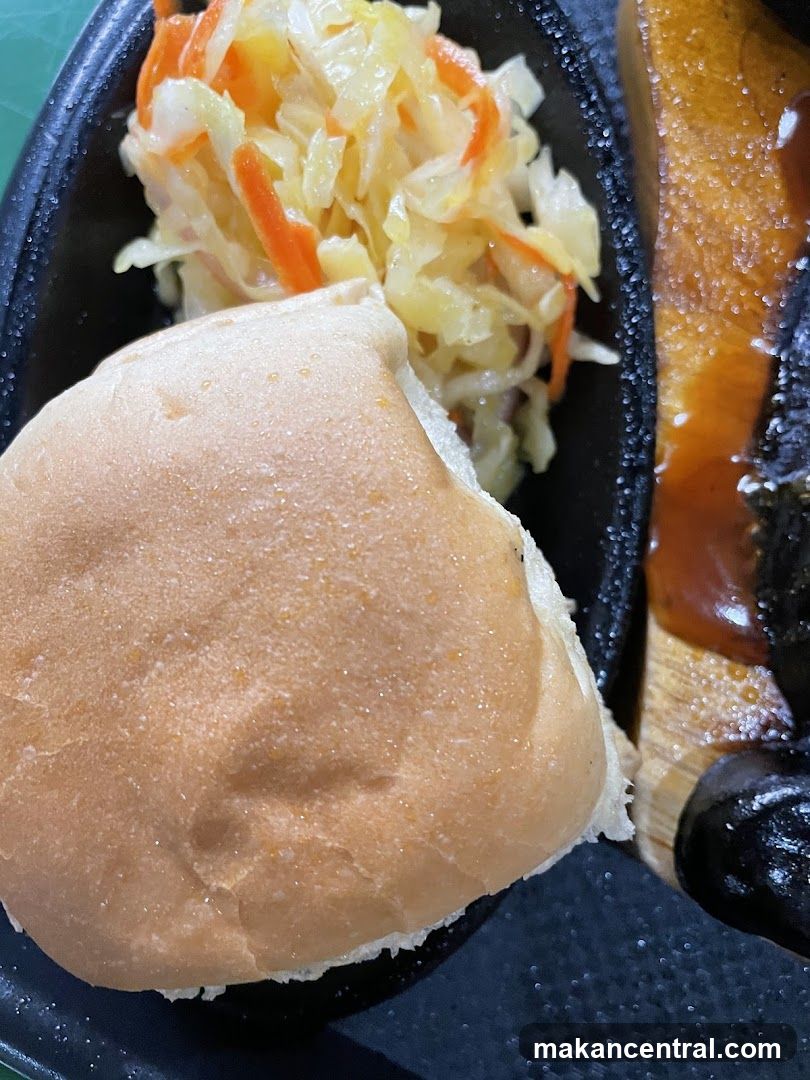 Bread roll with coleslaw and meat