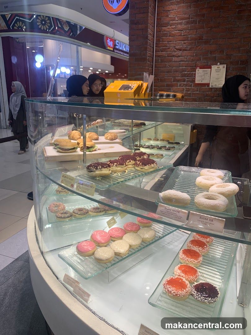 Donuts and pastries in a display case