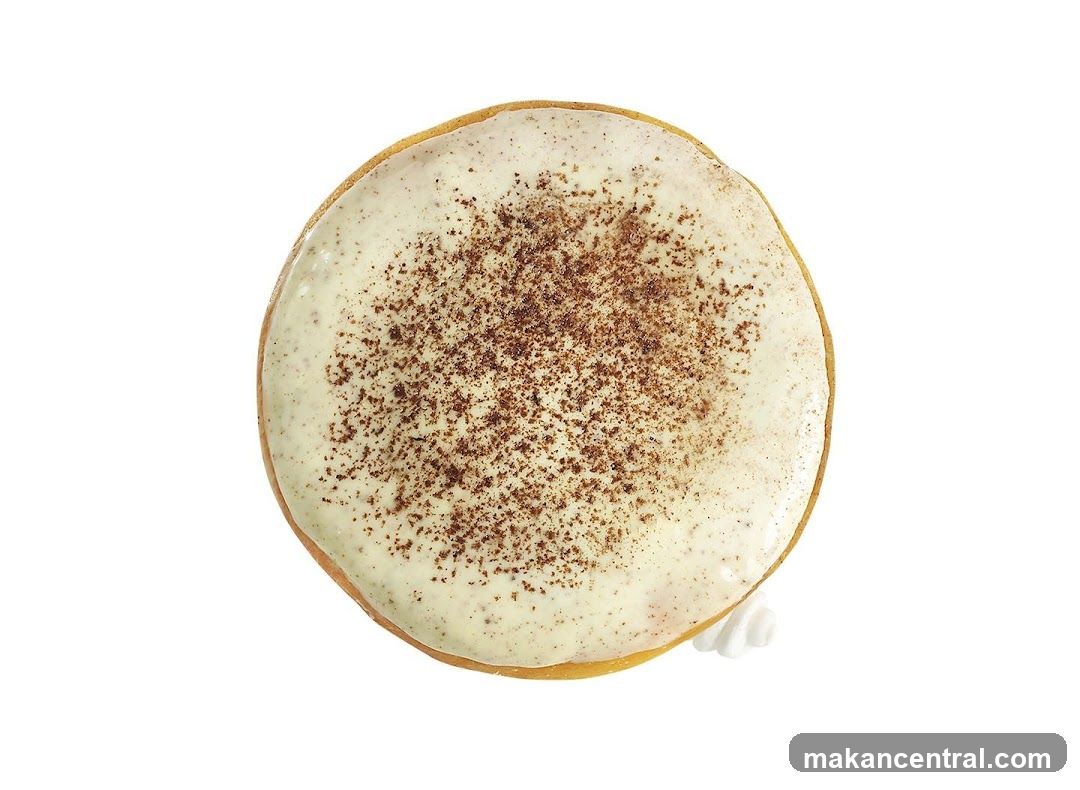 Donut with White Icing and Cinnamon