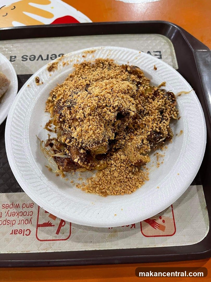 Food on a plate with crushed peanuts