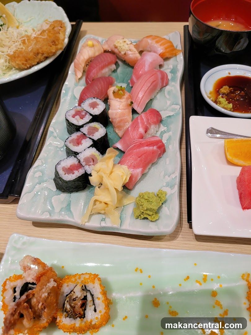 Assortment of Sushi and Fried Food