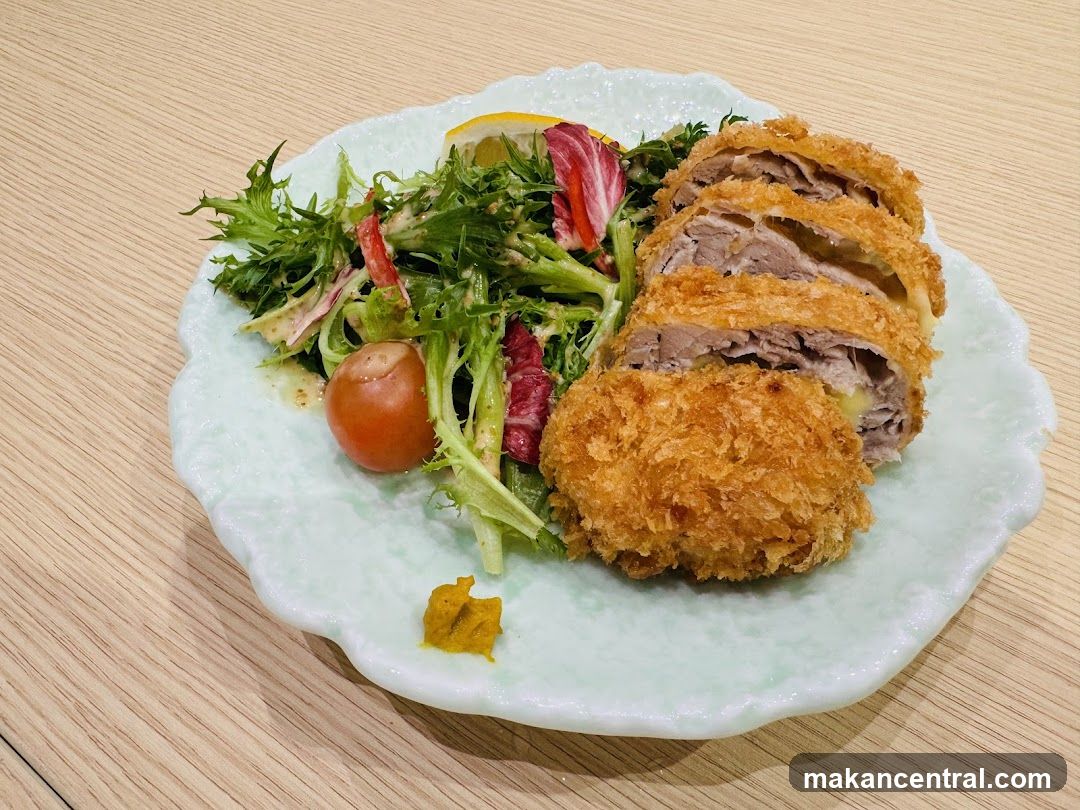 Breaded Meat Roll with Salad