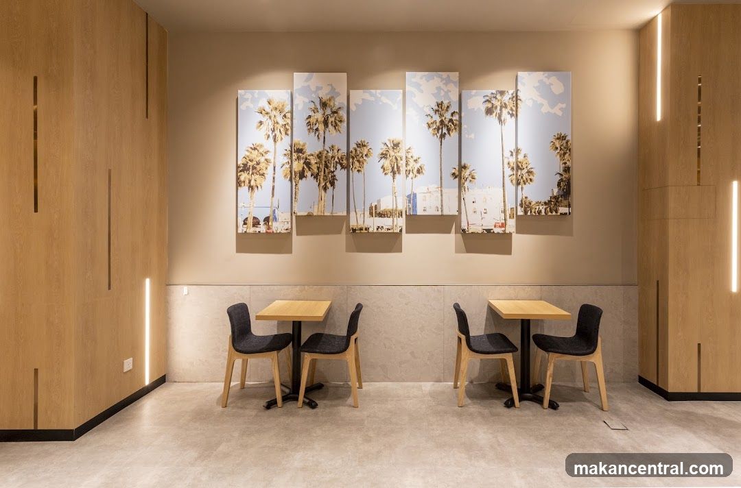 Modern Cafe Interior with Palm Tree Art