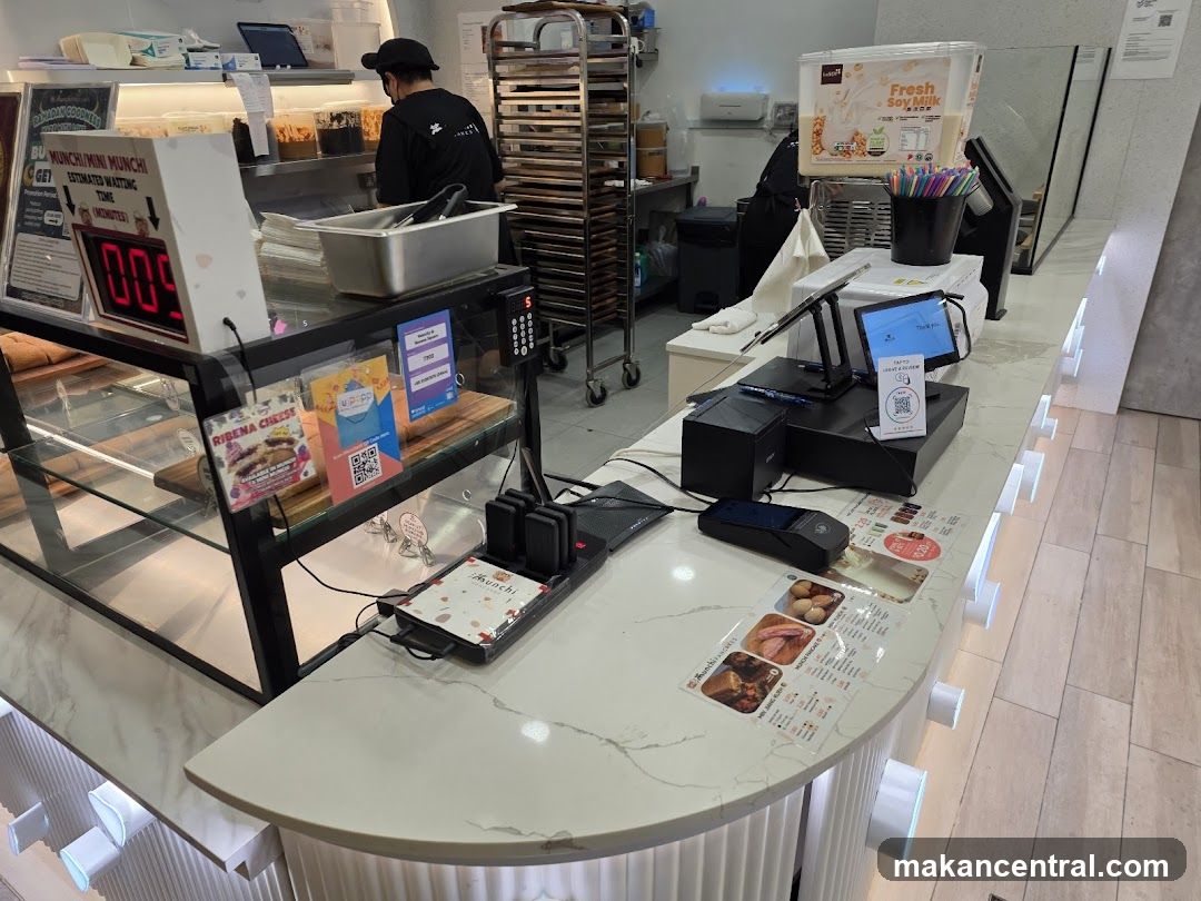 Counter with food display and payment terminals