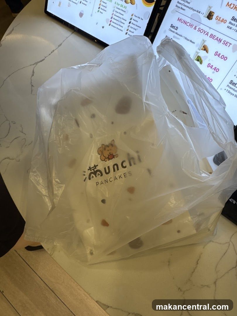 Takeaway Bag with Menu in Background