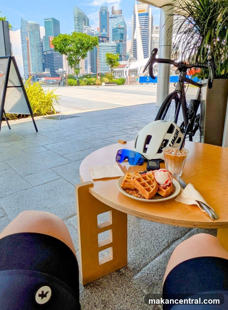 Outdoor cafe table with waffles and coffee