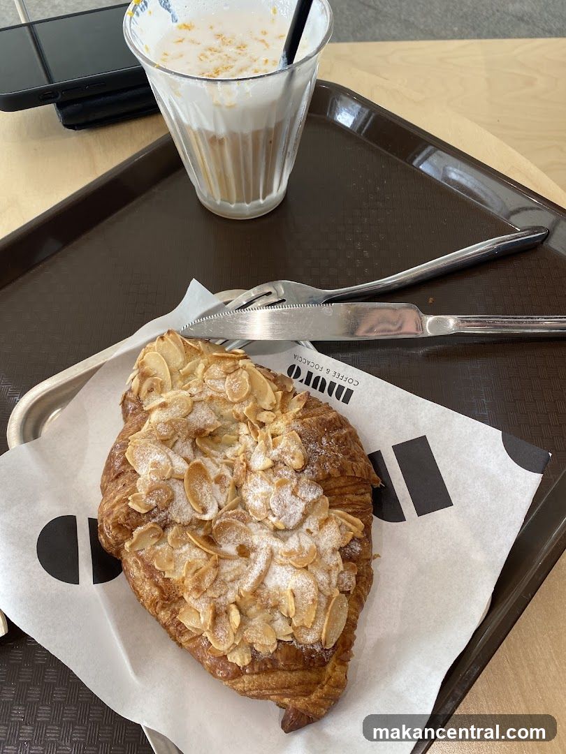 Almond Croissant and Coffee