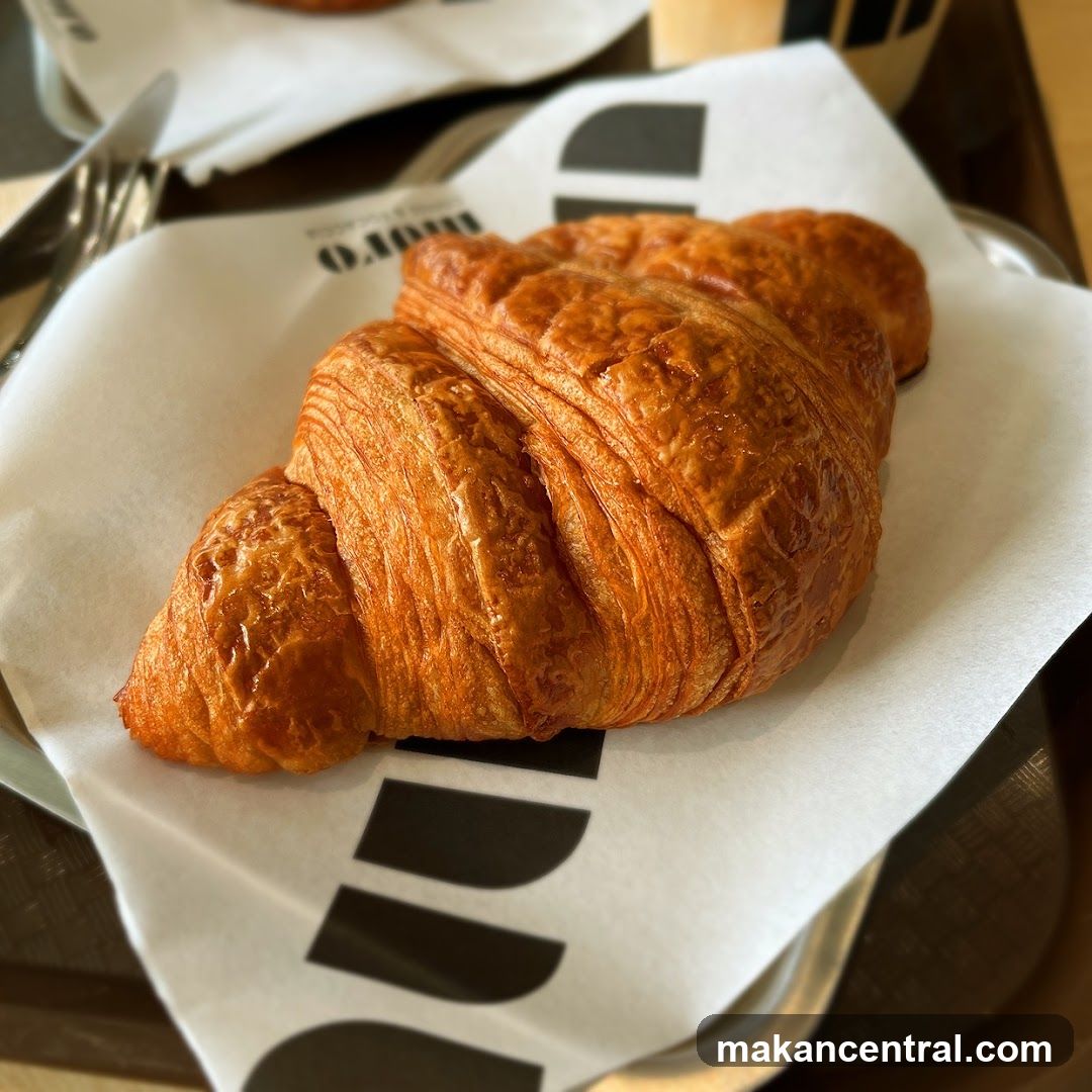 Croissant on Paper Liner