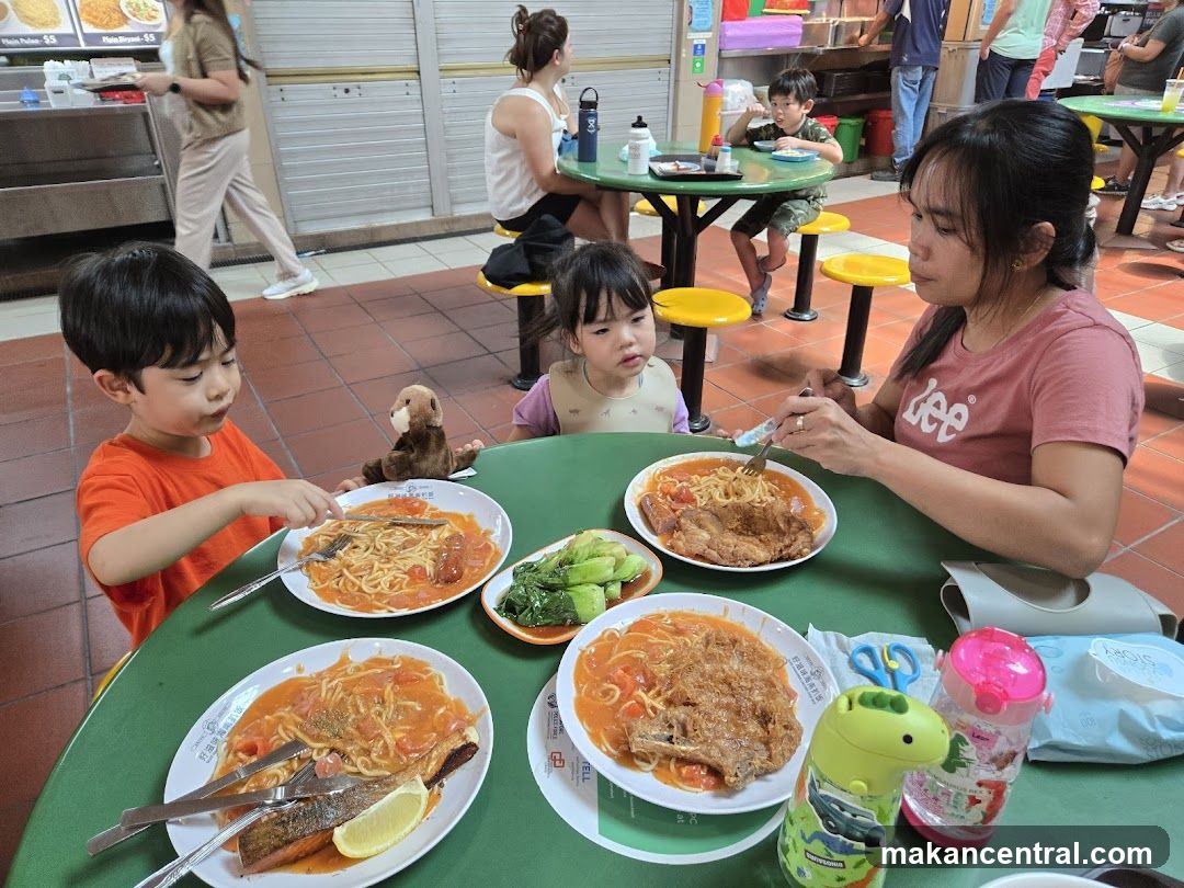Family enjoying a meal at a food court