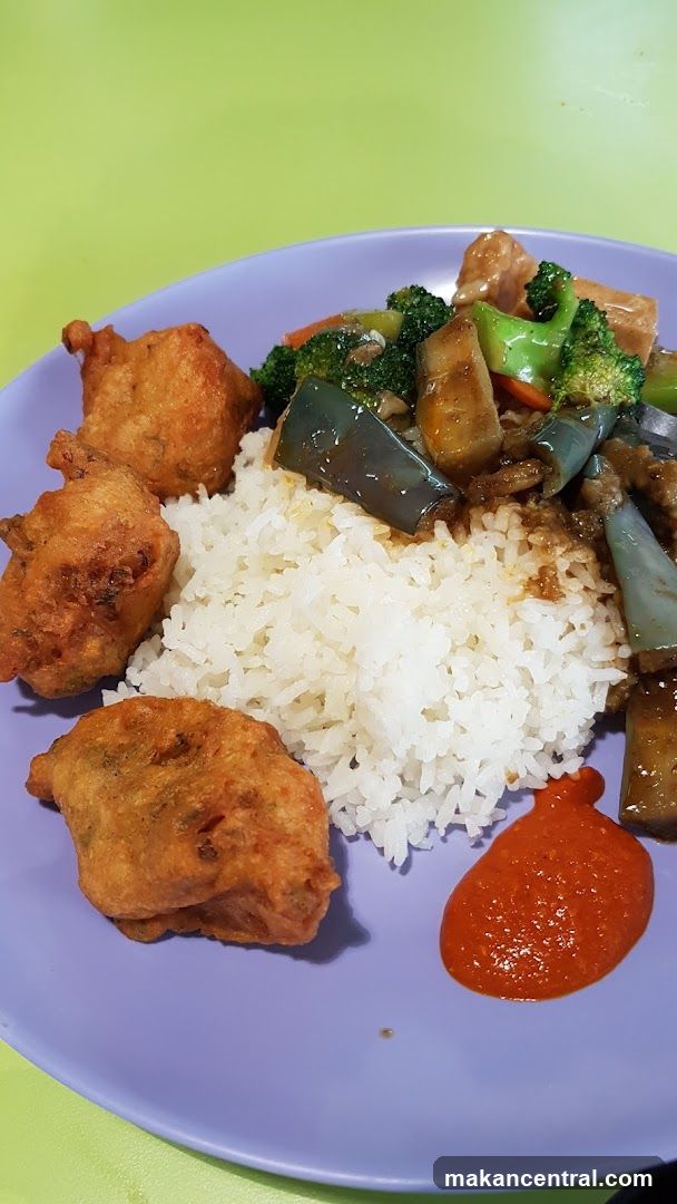 Plate of Rice with Fried Items and Vegetables