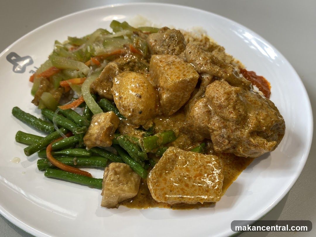Curry dish with rice and vegetables