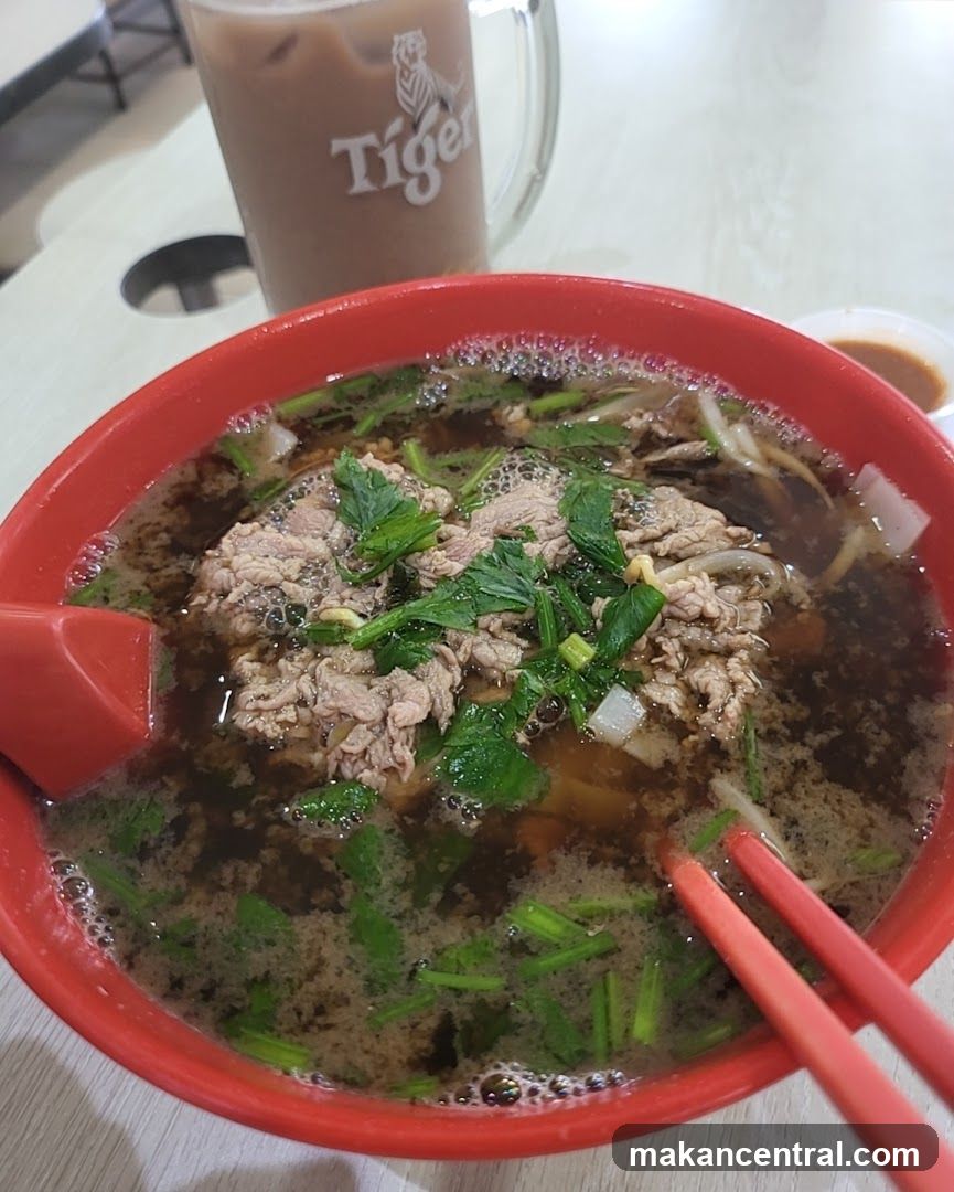 Beef noodle soup with iced drink