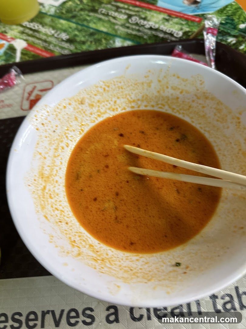 Partially Eaten Bowl of Soup
