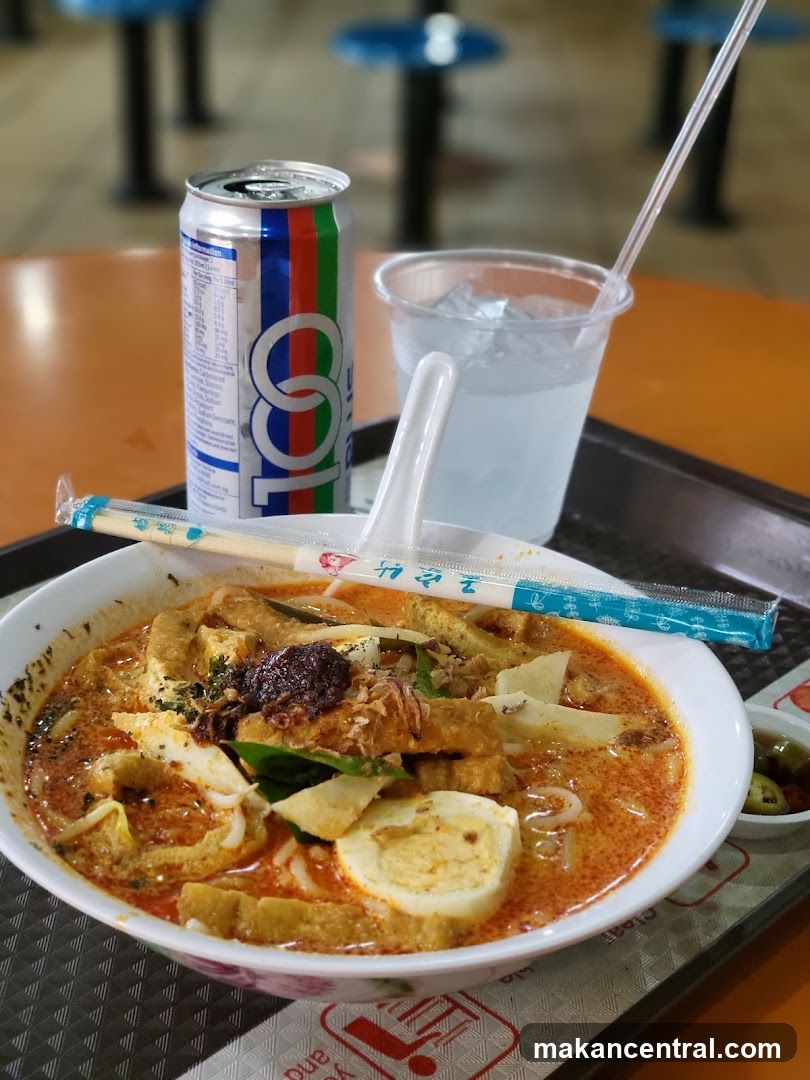 Laksa with a canned drink