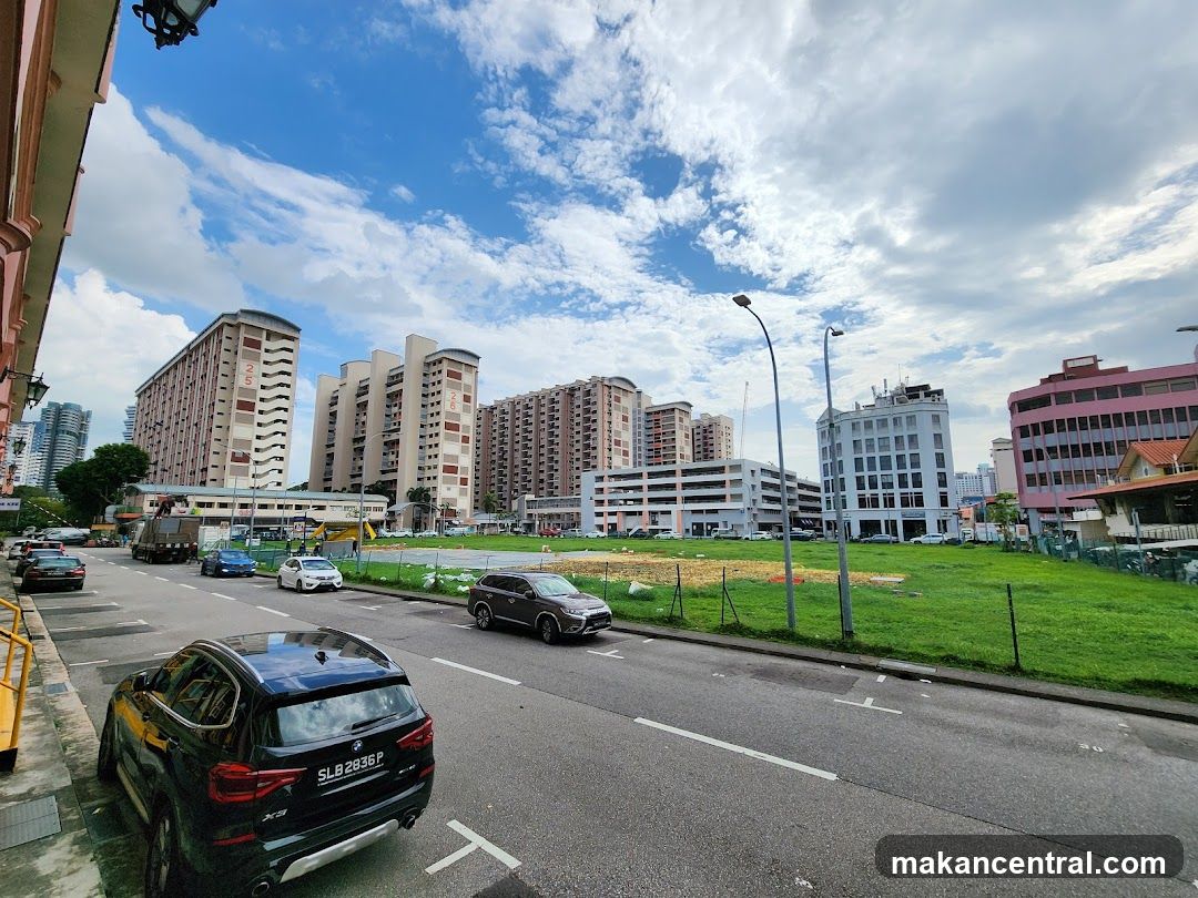 Street View with Apartment Buildings and Green Space