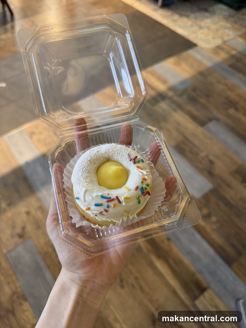 Donut in a clear plastic container