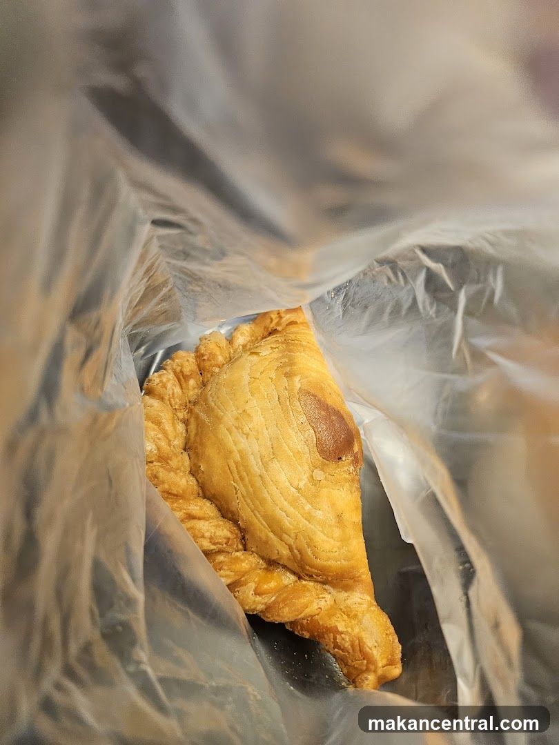 Curry Puff in Plastic Bag