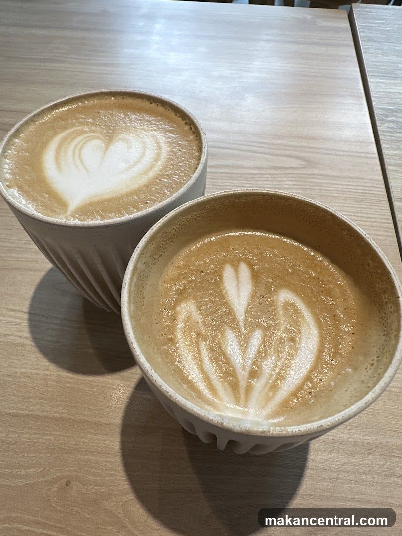 Two coffees with latte art