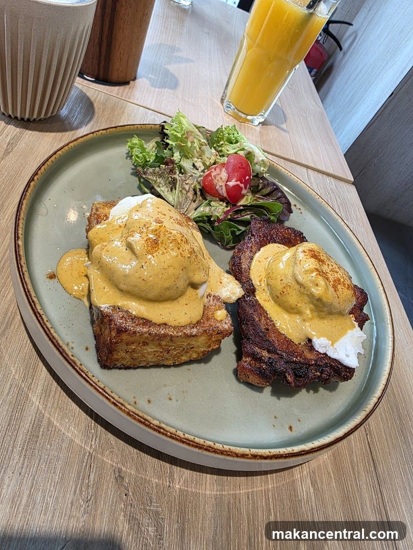 Eggs Benedict with Salad and Orange Juice