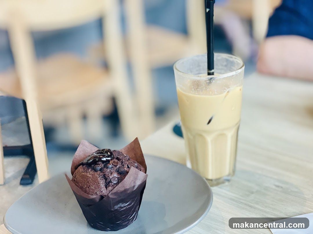 Chocolate muffin and iced coffee