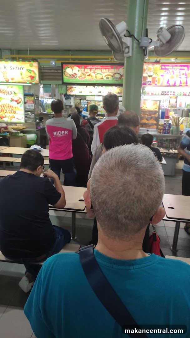 Food court with people queuing