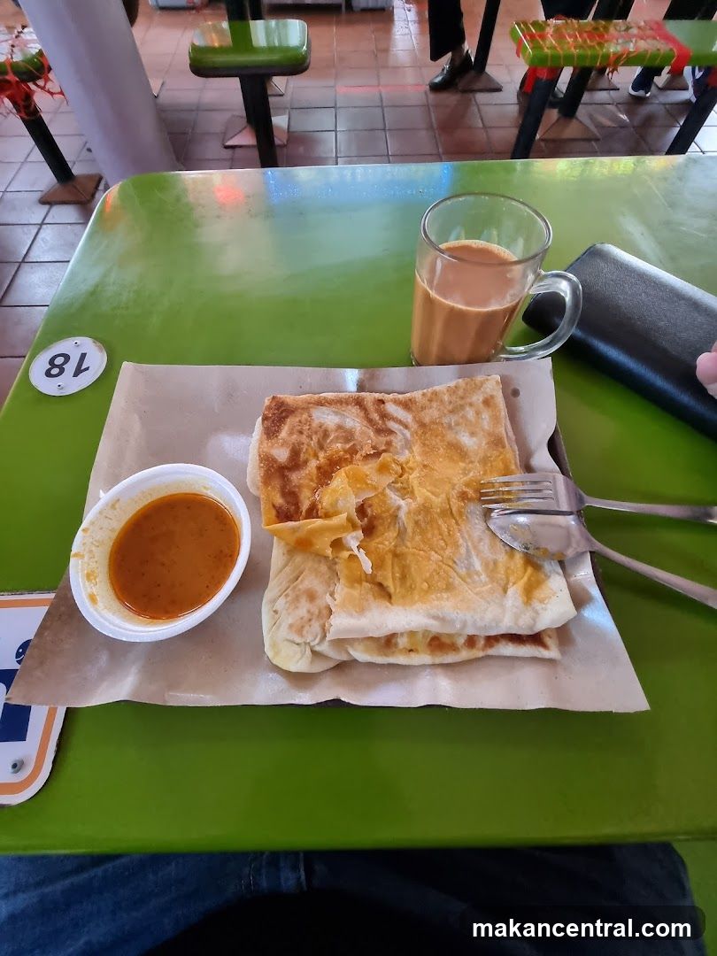 Roti Canai with Curry and Tea