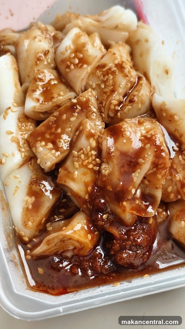 Cheung Fun with Sauce and Sesame Seeds