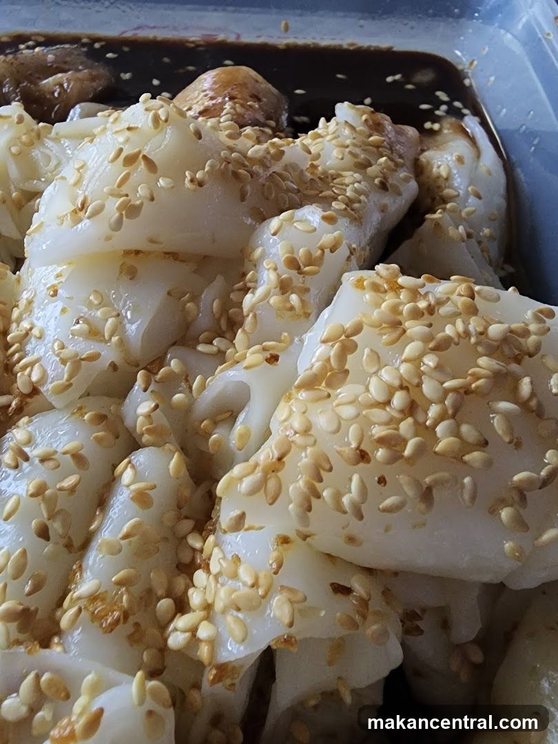 Steamed Rice Rolls with Sesame Seeds