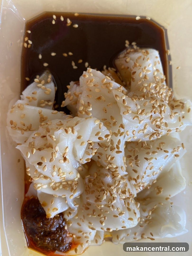 Rice Noodle Rolls with Sauce and Sesame Seeds