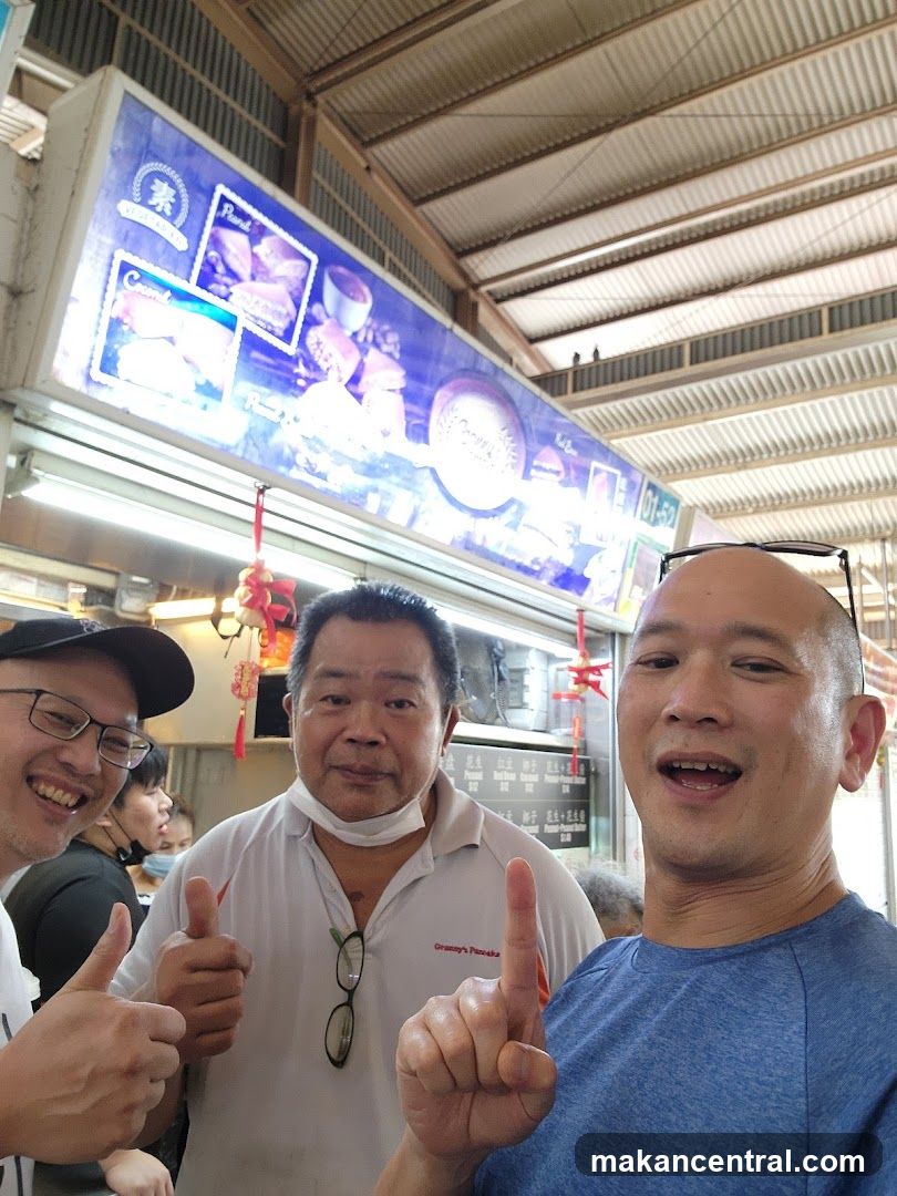 Three Men Posing for a Photo
