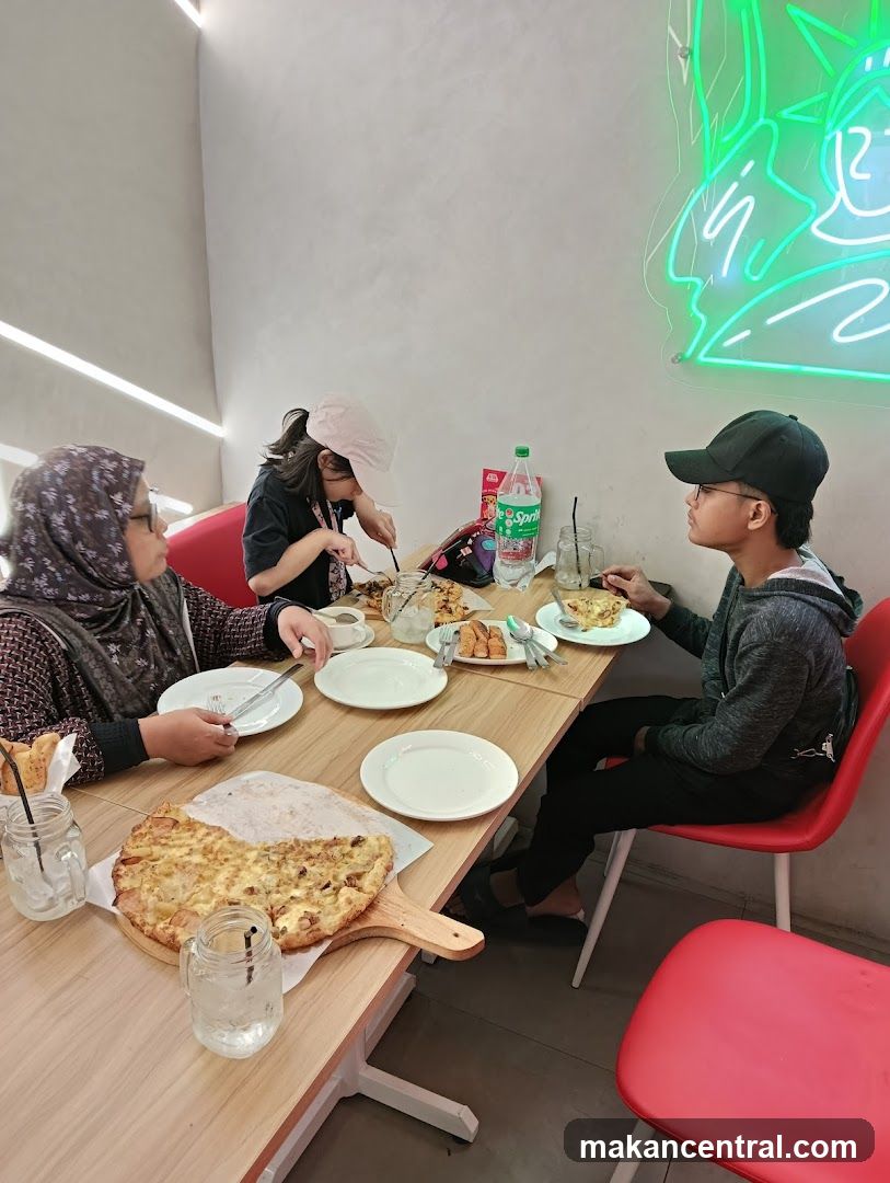 Family enjoying a meal at a restaurant