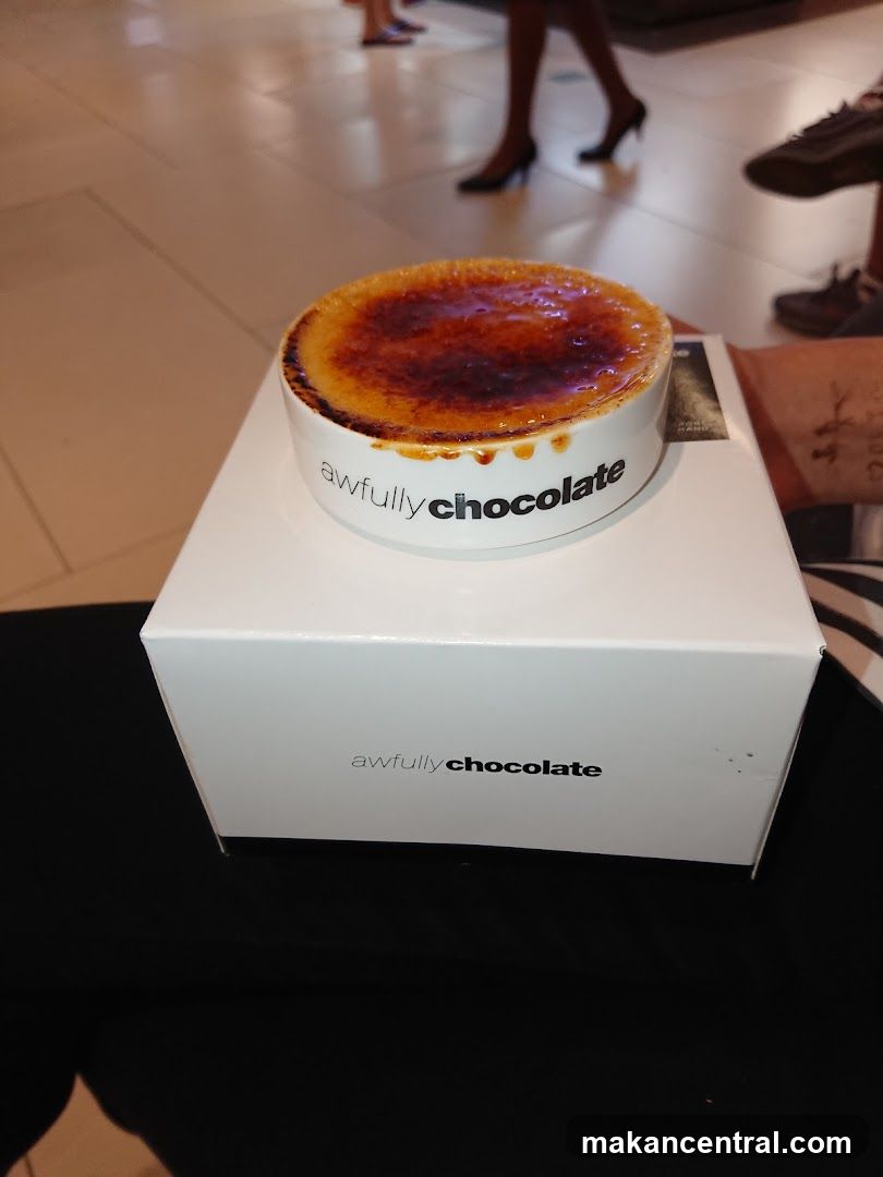 Dessert in a bowl with branded packaging