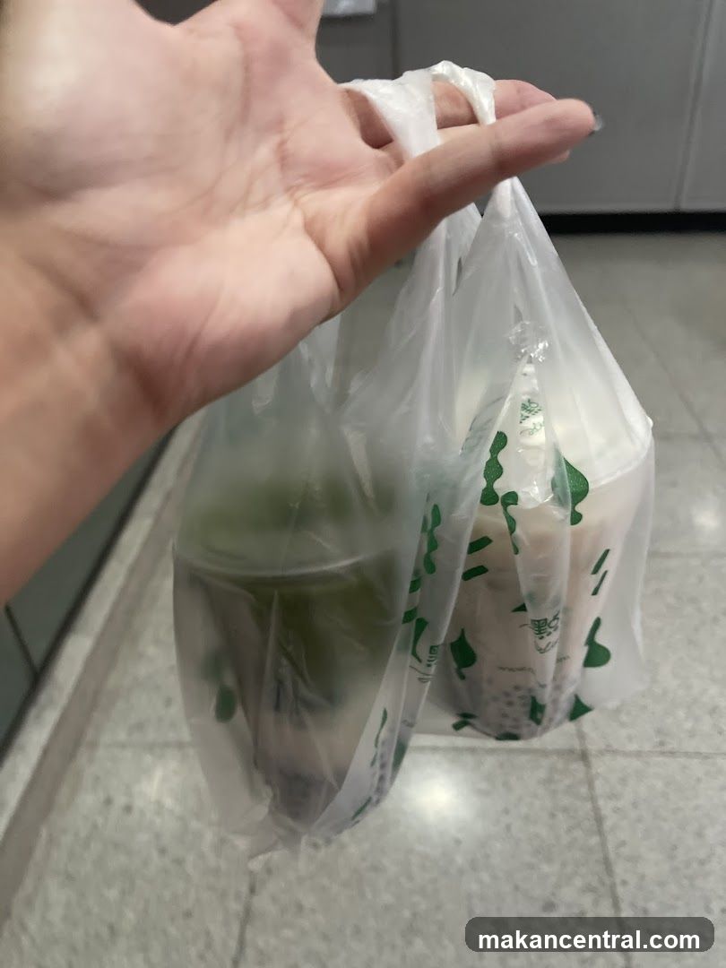 Two drinks in a plastic bag