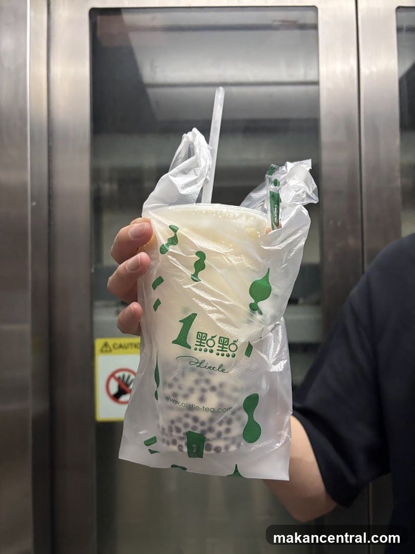 Person holding a bubble tea