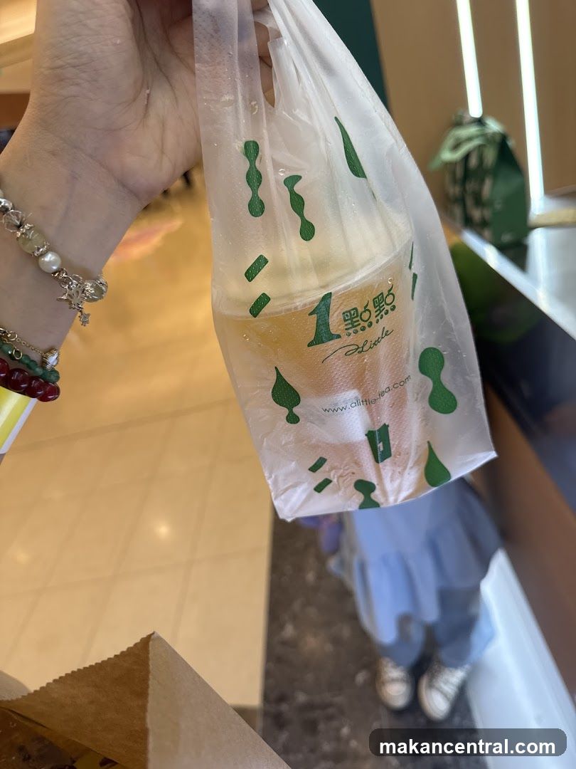 Beverage in a branded plastic bag