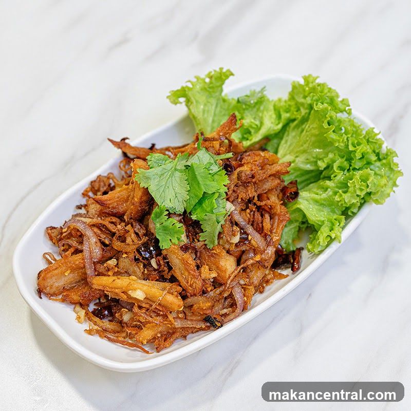 Crispy Fried Dish with Lettuce and Cilantro