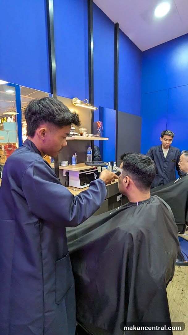 Barber giving a haircut