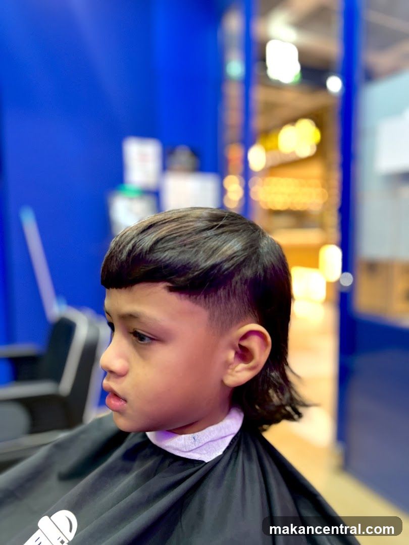 Young boy getting a haircut