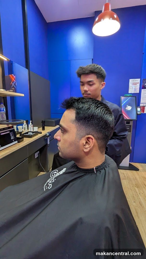 Barber giving a haircut