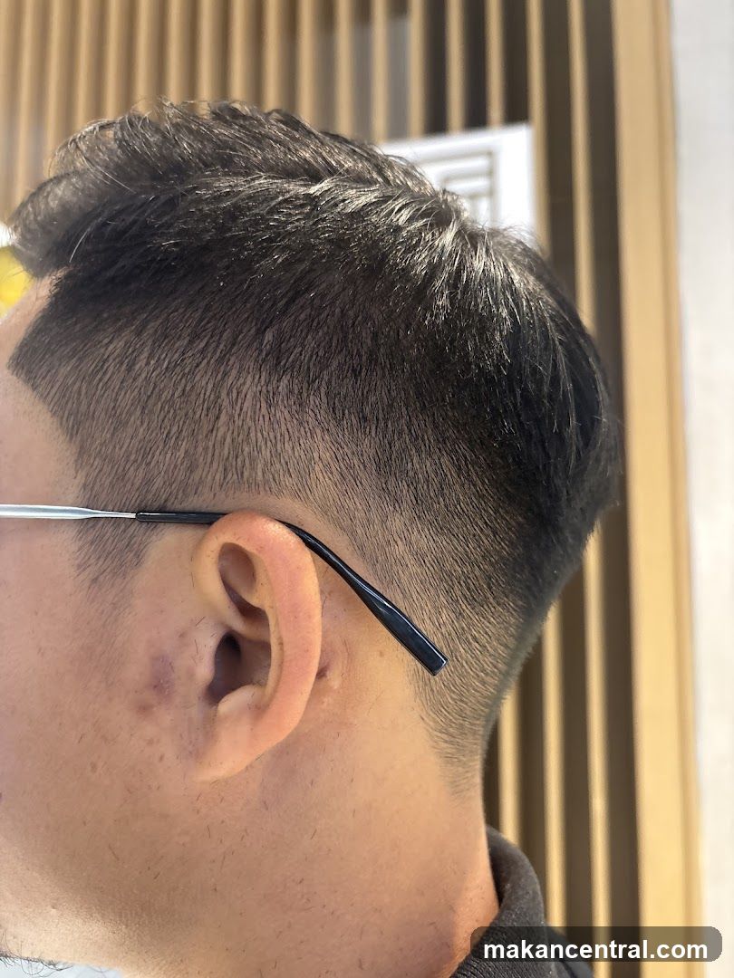 Close-up of a man's haircut