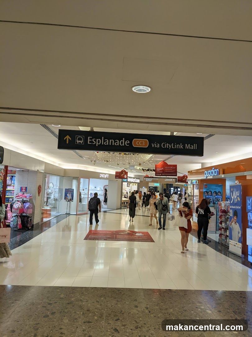 Mall Interior with Shops and Signage