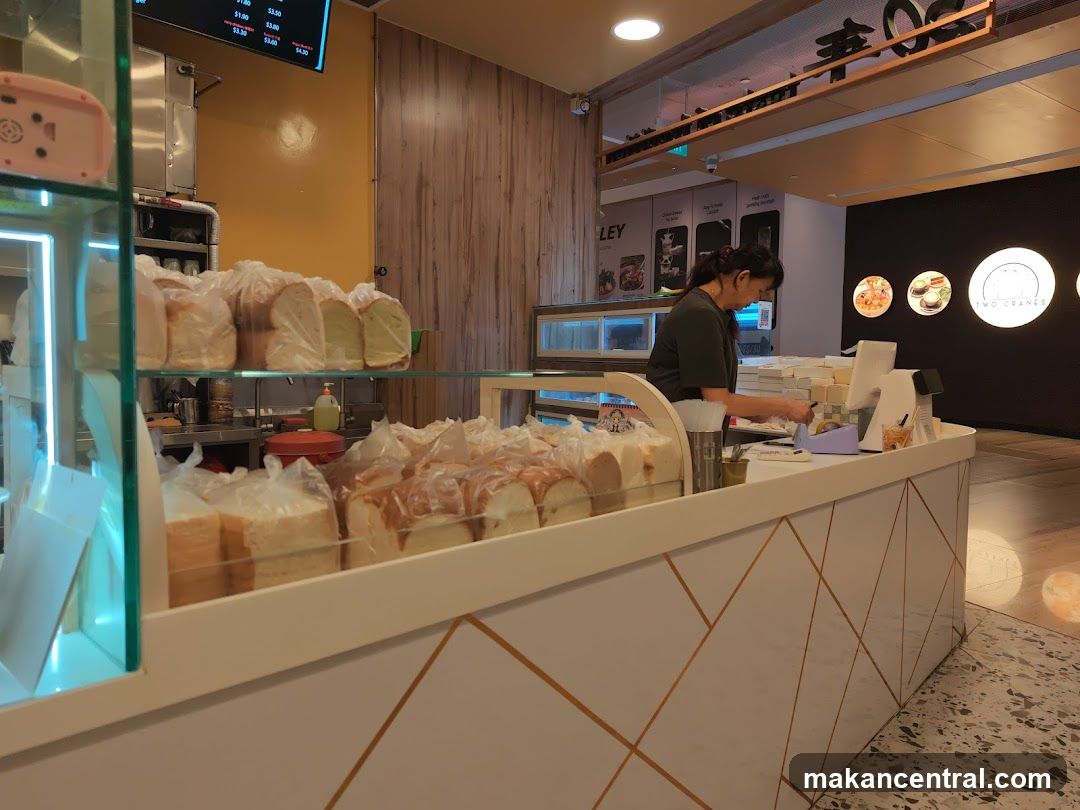 Bakery Counter with Bread and Staff