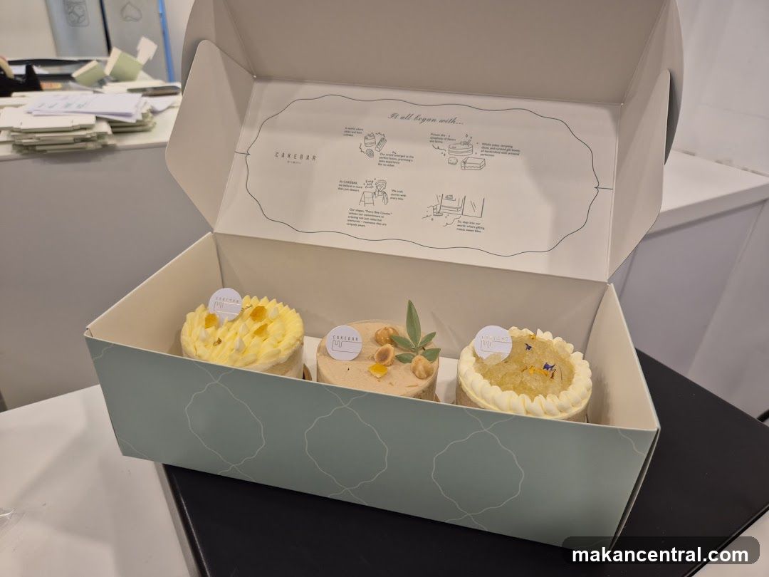 Three small cakes in a box