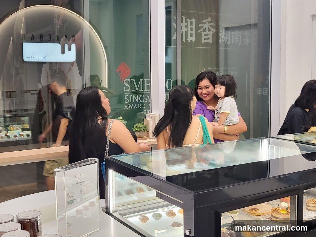 People at a dessert shop