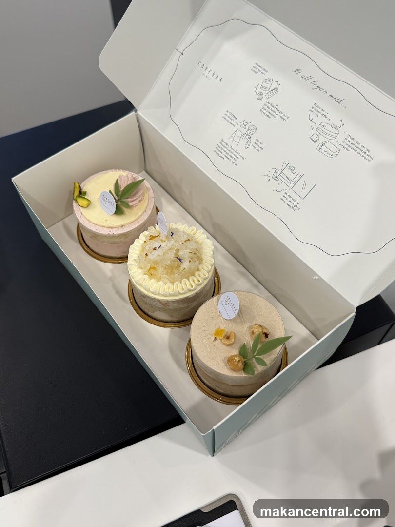 Three small cakes in a box